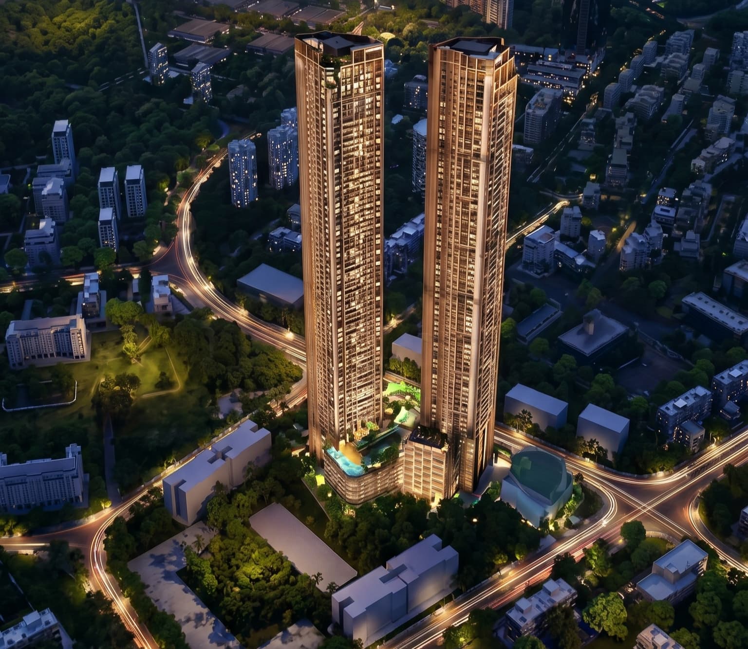 Runwal Raaya's twin towers illuminated above Worli at twilight